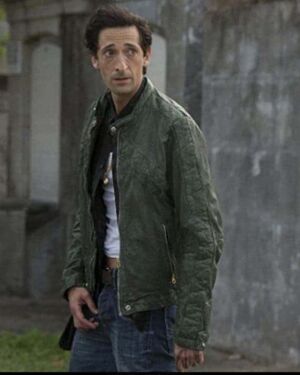 American Heist Adrien Brody Green jacket